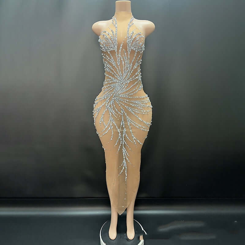 <p>Cut with fluid elegance, this silhouette glides through the evening with quiet confidence and an unmistakable sense of allure. Every movement reveals a refined presence that lingers long after the moment has passed.</p>