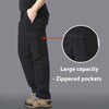 Men's black climbing trousers with zippered pockets, showcasing a large capacity for outdoor activities.
