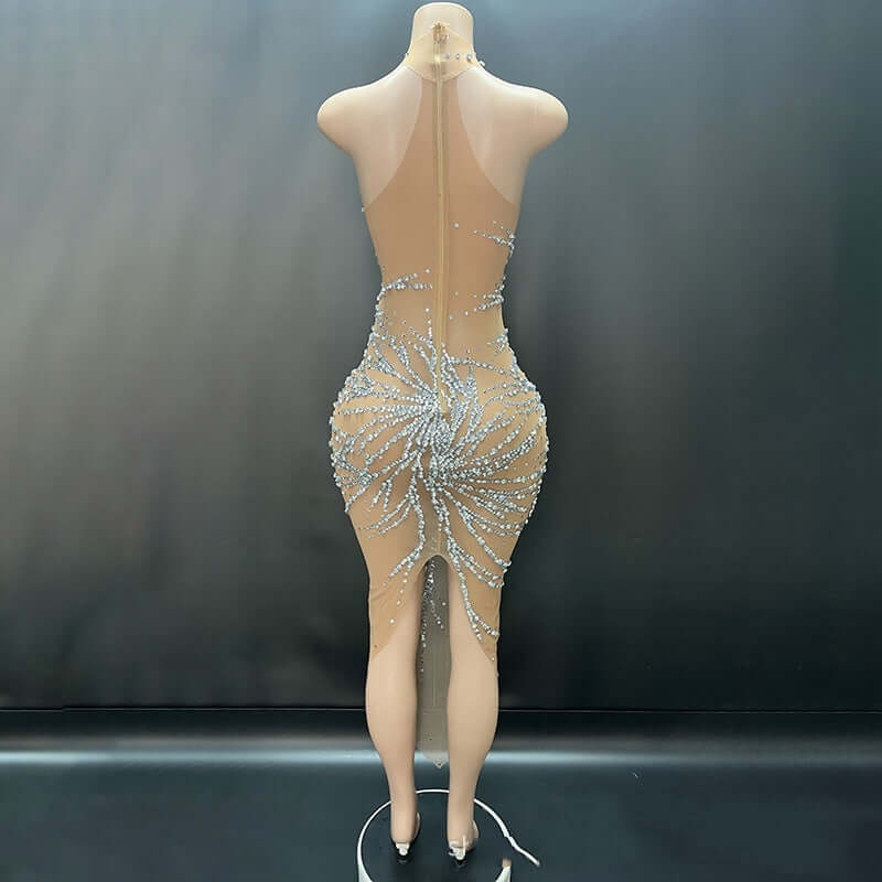 <p>Cut with fluid elegance, this silhouette glides through the evening with quiet confidence and an unmistakable sense of allure. Every movement reveals a refined presence that lingers long after the moment has passed.</p>