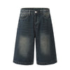 Men's blue cropped street casual pants made of polyester cotton, featuring a relaxed fit and stylish denim finish.