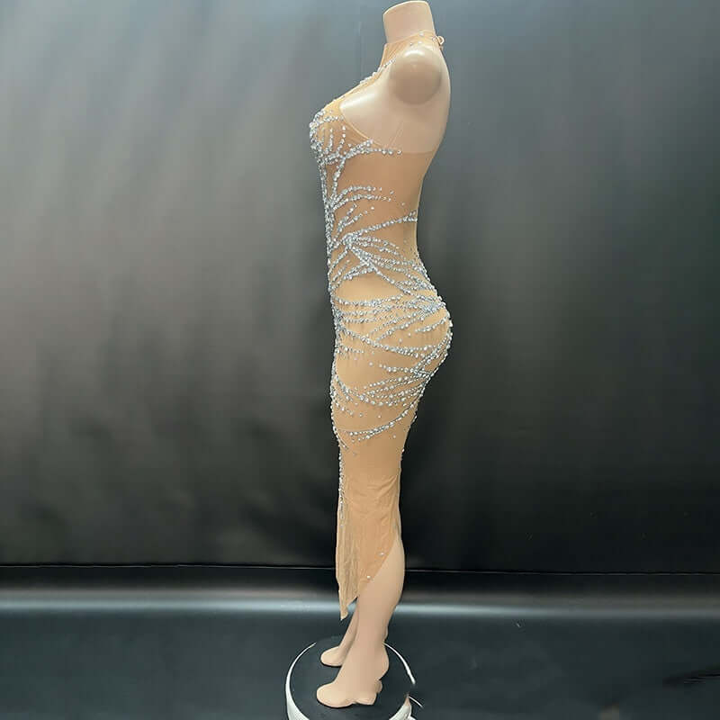 <p>Cut with fluid elegance, this silhouette glides through the evening with quiet confidence and an unmistakable sense of allure. Every movement reveals a refined presence that lingers long after the moment has passed.</p>