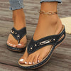 Comfortable black retro flip-flops with decorative hardware, perfect for casual plus-size women's sandals.