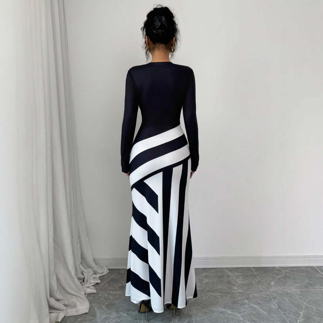 <p>Cut with fluid elegance, this silhouette glides through the evening with quiet confidence and an unmistakable sense of allure. Every movement reveals a refined presence that lingers long after the moment has passed.</p>
