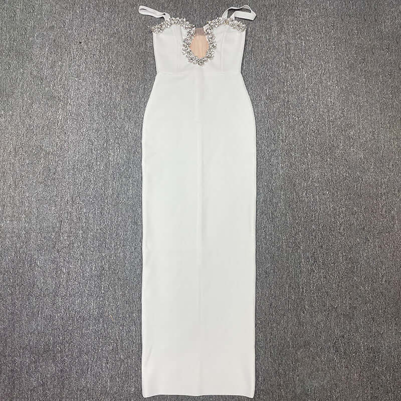 <p>Cut with fluid elegance, this silhouette glides through the evening with quiet confidence and an unmistakable sense of allure. Every movement reveals a refined presence that lingers long after the moment has passed.</p>