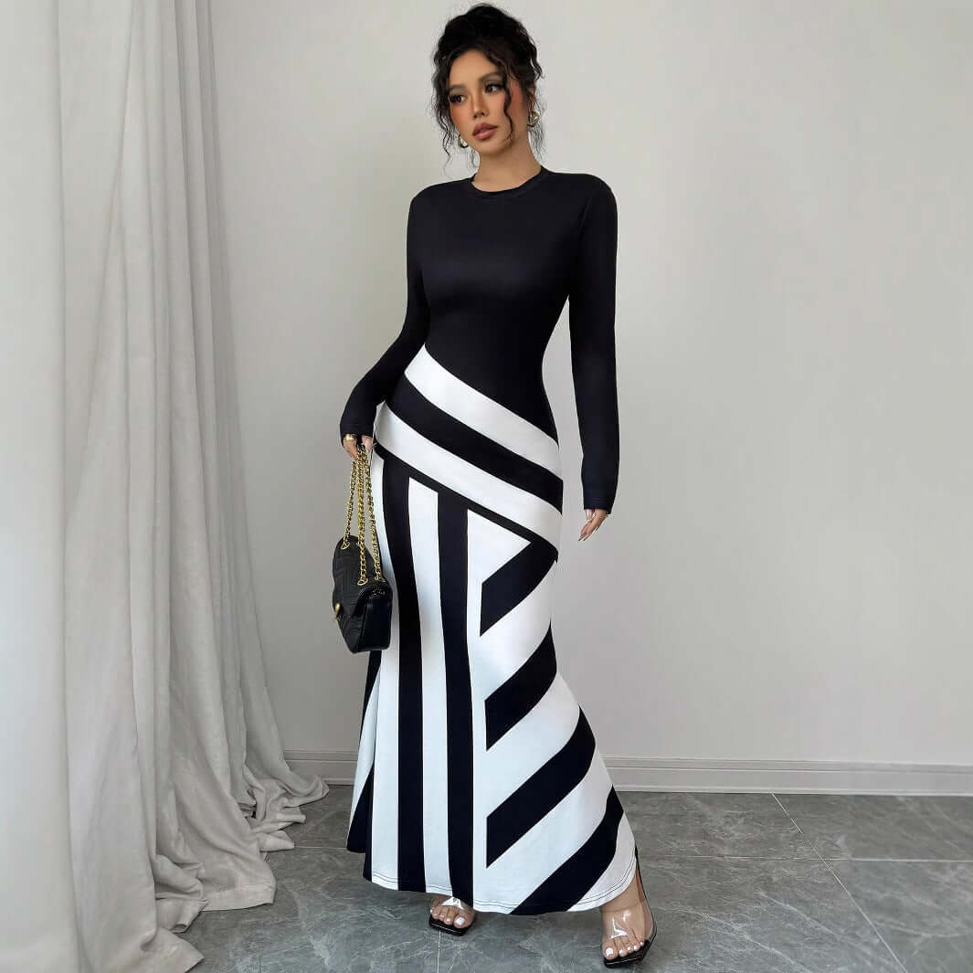 <p>Cut with fluid elegance, this silhouette glides through the evening with quiet confidence and an unmistakable sense of allure. Every movement reveals a refined presence that lingers long after the moment has passed.</p>