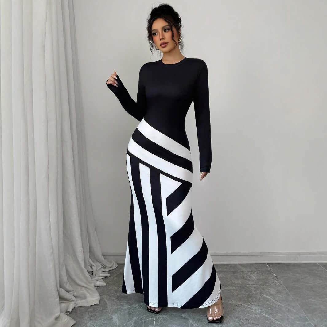 <p>Cut with fluid elegance, this silhouette glides through the evening with quiet confidence and an unmistakable sense of allure. Every movement reveals a refined presence that lingers long after the moment has passed.</p>