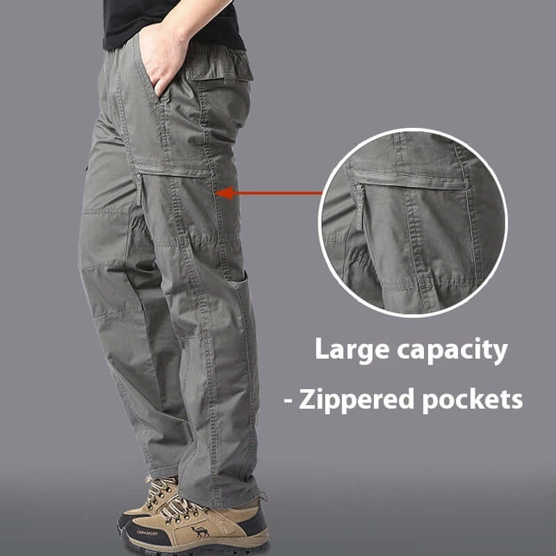 Men's gray casual trousers with large zippered pockets, ideal for outdoor activities and sport climbing.