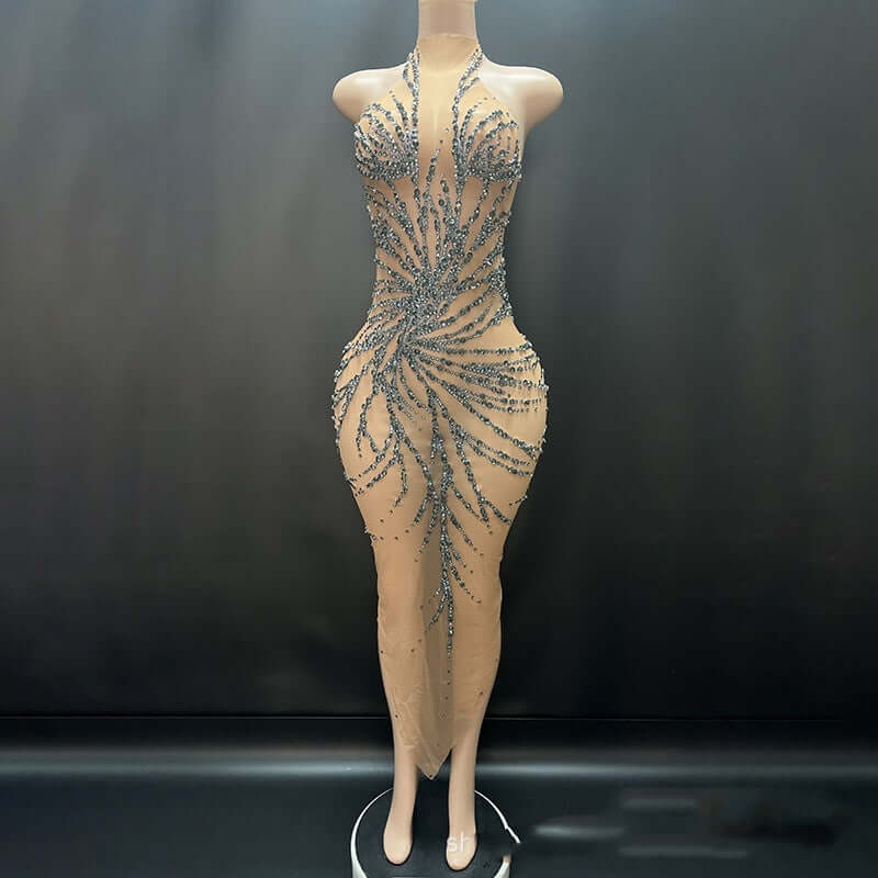 <p>Cut with fluid elegance, this silhouette glides through the evening with quiet confidence and an unmistakable sense of allure. Every movement reveals a refined presence that lingers long after the moment has passed.</p>