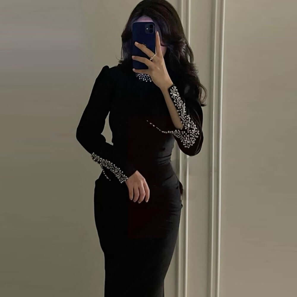 <p>Cut with fluid elegance, this silhouette glides through the evening with quiet confidence and an unmistakable sense of allure. Every movement reveals a refined presence that lingers long after the moment has passed.</p>